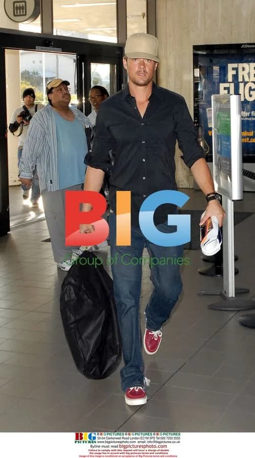 Josh Duhamel rushes through LAX