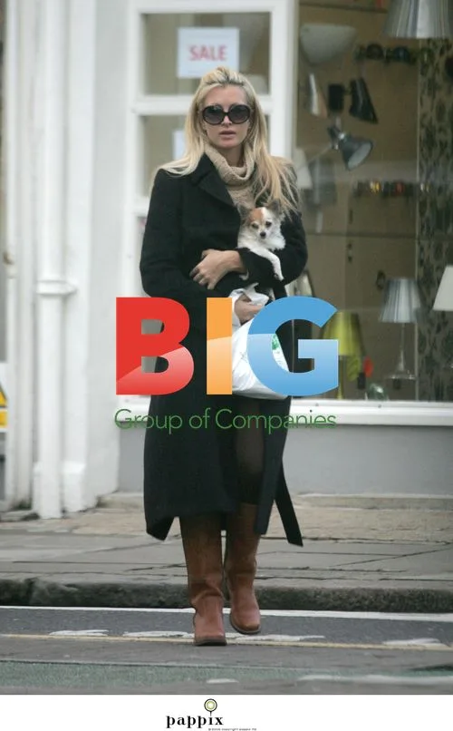 Caprice Bourret out with dog