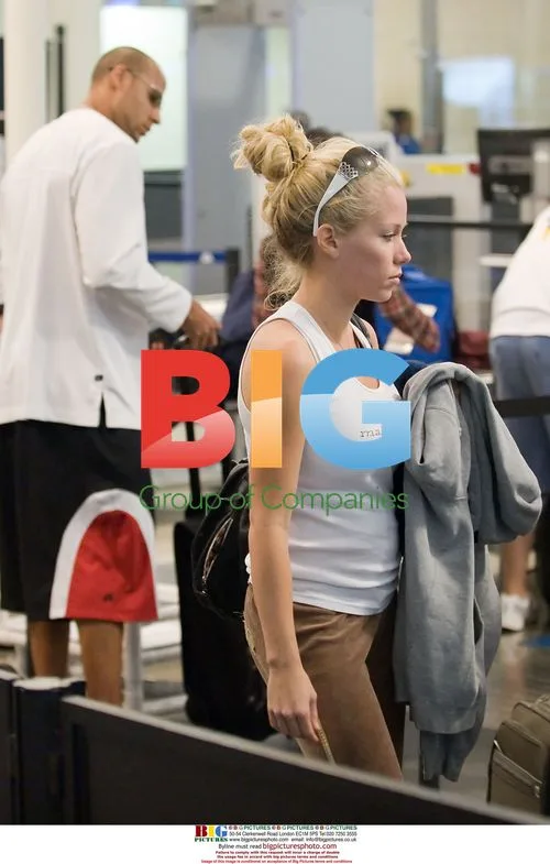 Kendra Wilkinson and Hank Baskett Depart LAX
