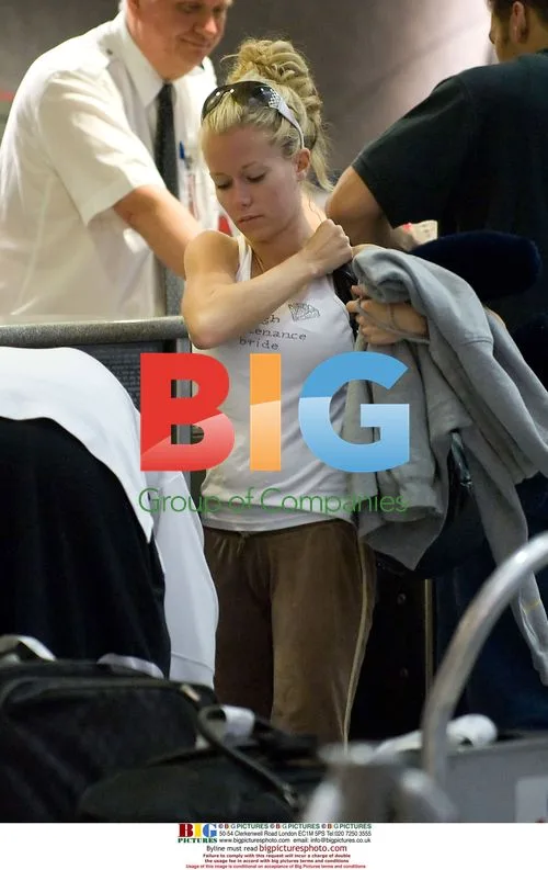 Kendra Wilkinson and Hank Baskett Depart LAX