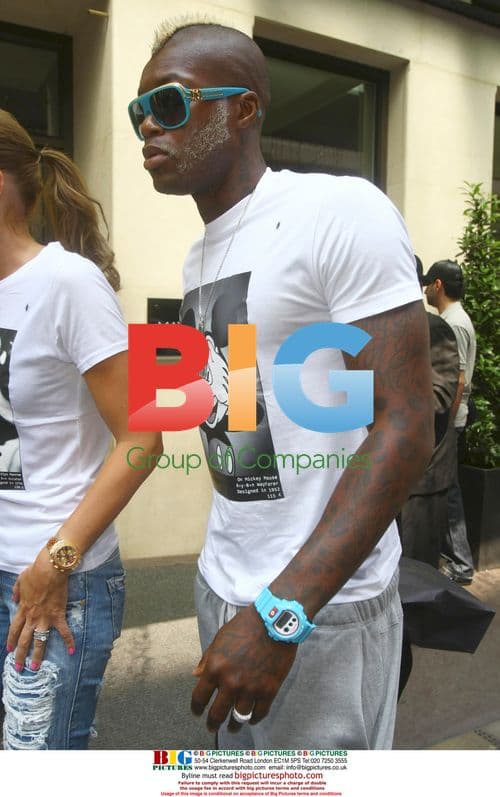 Footballer Djibril Cisse and wife Jude outside the Mayfair Hotel