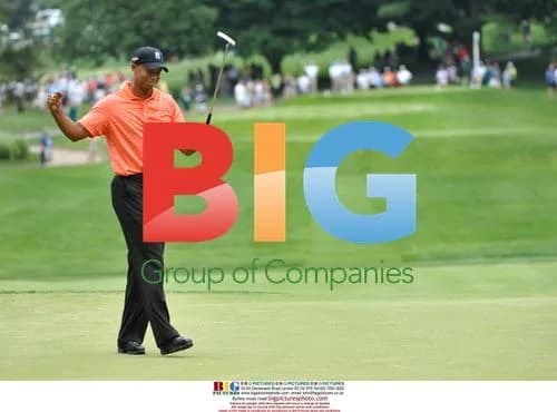 Tiger Woods celebrates putt at AT&T National