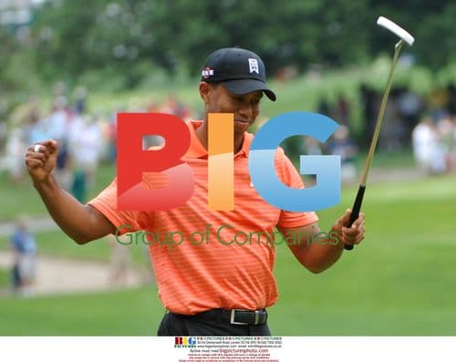 Tiger Woods Celebrates Putt at AT&T National