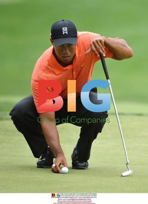 Tiger Woods lines up putt at AT&T National