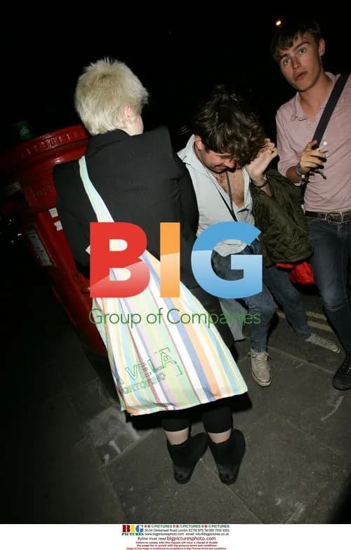 Nick Grimshow leaves Blur party with companion