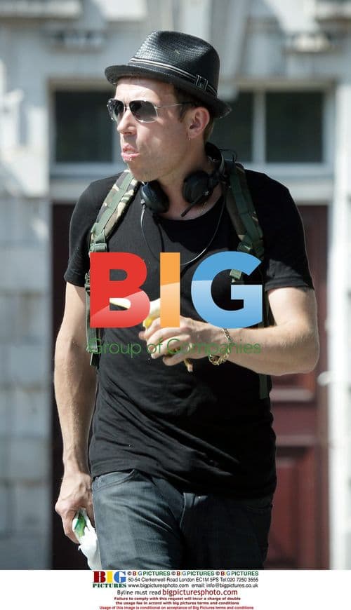 Damon Albarn eating banana in London