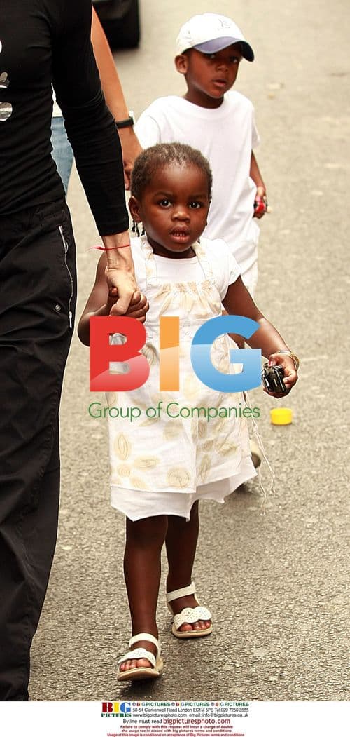 Madonna with adopted kids in London