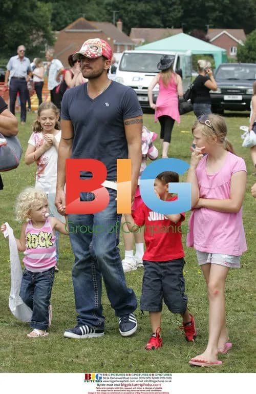 Peter Andre with kids at fair in Cowfold