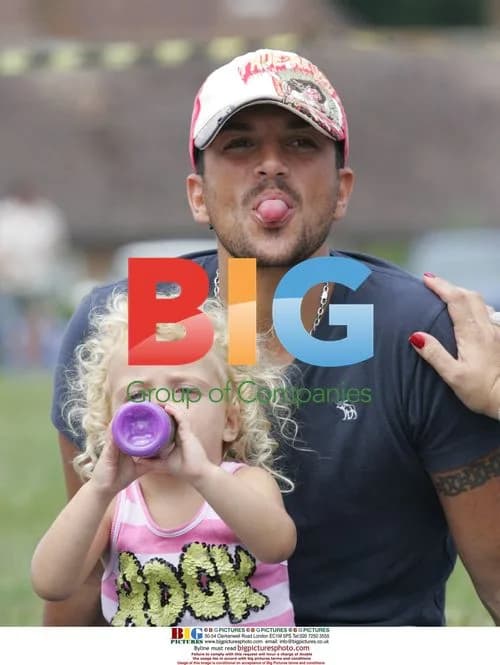 Peter Andre with kids at fair