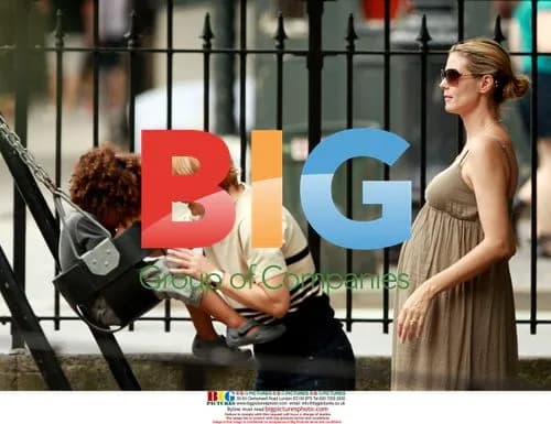 Heidi Klum shows off baby bump at park