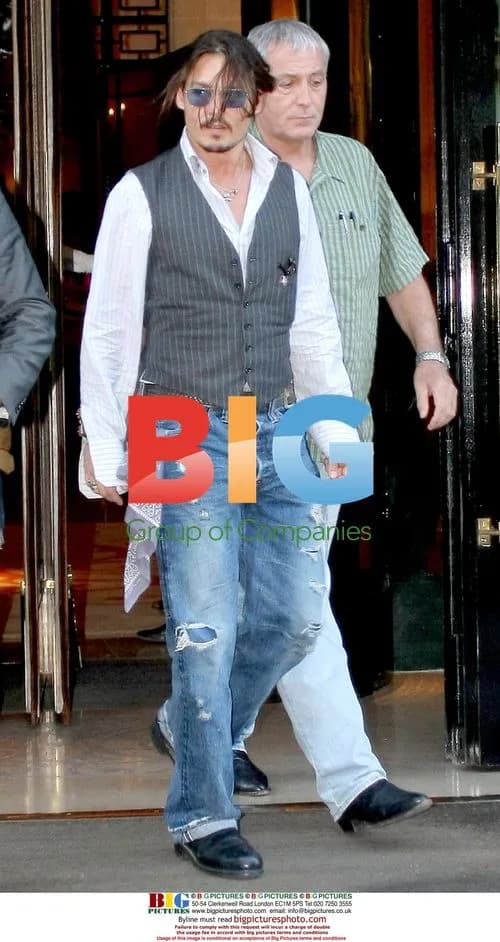 Johnny Depp leaves hotel in Paris