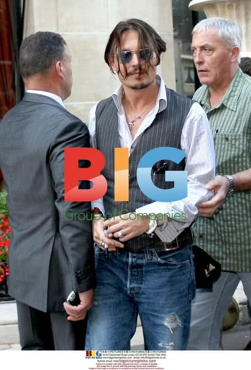 Johnny Depp Leaves Hotel in Paris