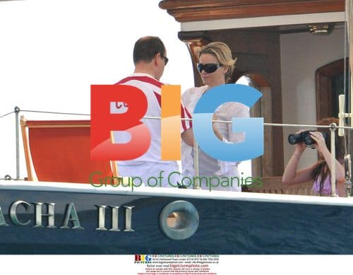 Prince Albert II and Charlene Wittstock sunbathing