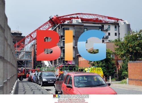 Collapsed crane on apartment building in Liverpool, UK