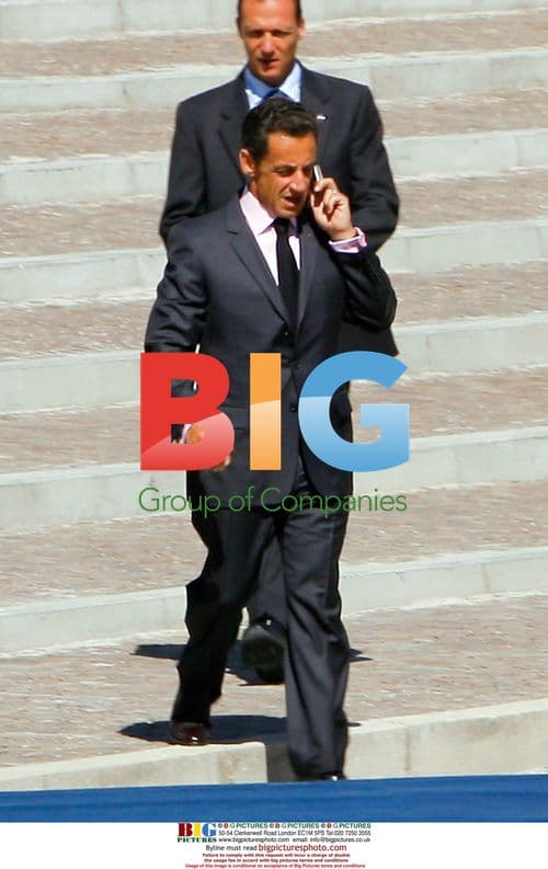 Sarkozy arrives for G8 summit in Italy