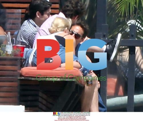 Charlize Theron entertains friends