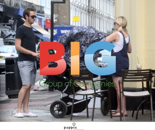 Edith Bowman and Tom Smith with baby in London