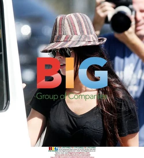 Megan Fox gets into car on Montana Ave