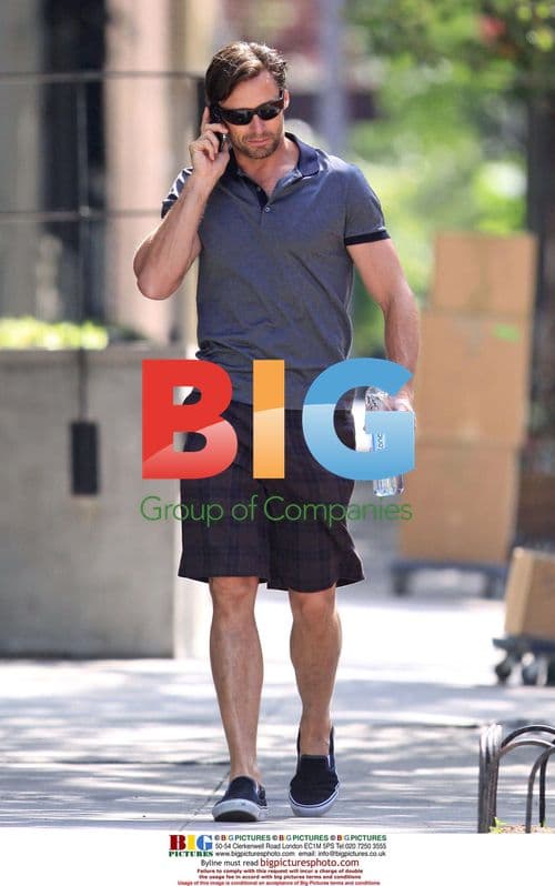 Hugh Jackman chats on phone in NYC