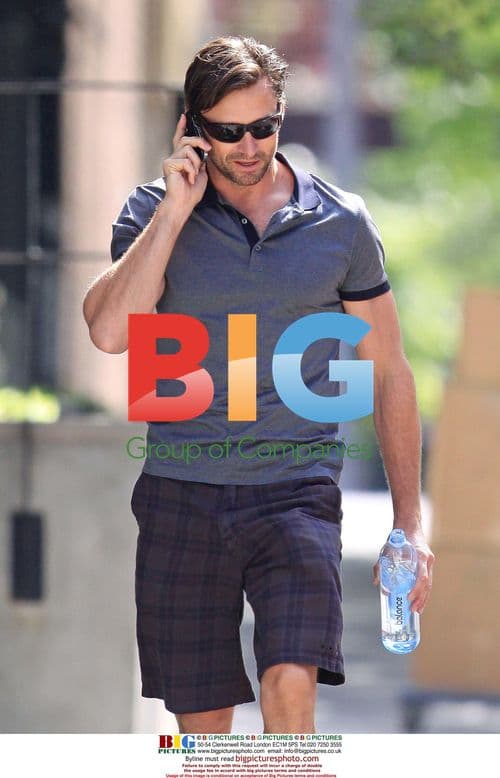 Hugh Jackman chats on phone in West Village, NYC