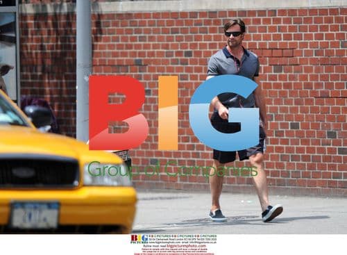 Hugh Jackman chats on phone in NYC