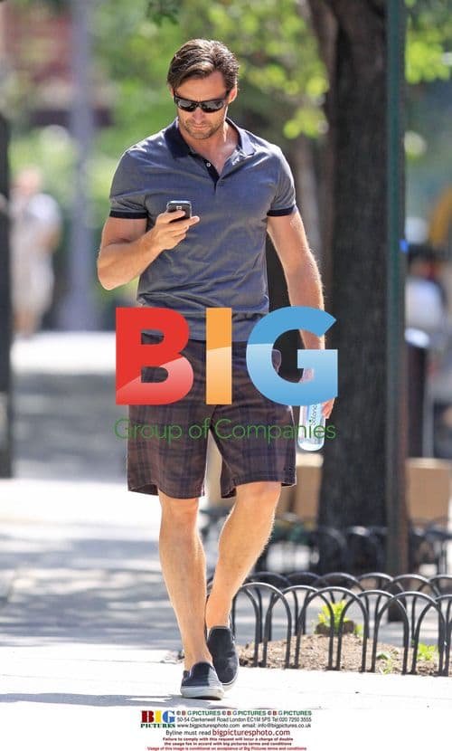 Hugh Jackman chats on phone in West Village