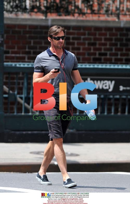 Hugh Jackman chats on phone in West Village