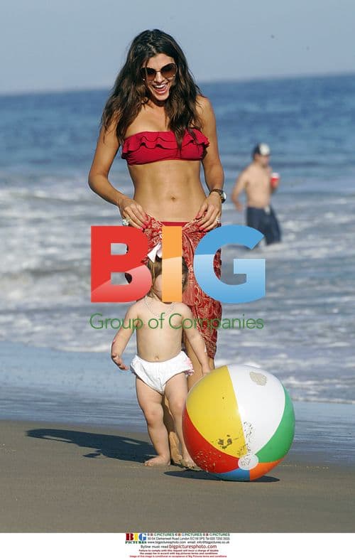 Ali Landry with daughter Estelle on Malibu beach