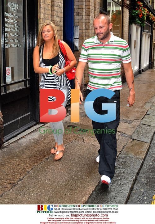 Kerry Katona and Mark Croft get soaked at zoo