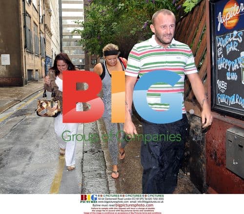 Kerry Katona and Mark Croft get soaked at the zoo