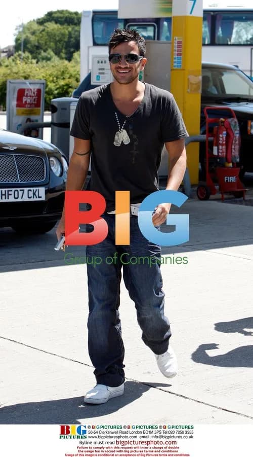 Peter Andre with family at theme park