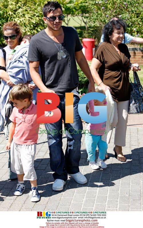 Peter Andre with family at theme park