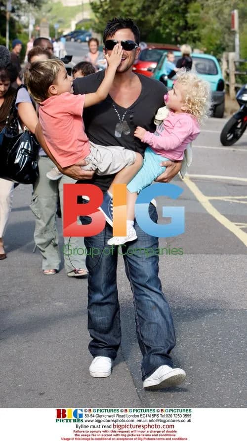 Peter Andre with family at theme park