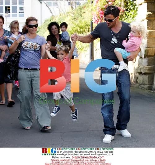 Peter Andre with family at theme park