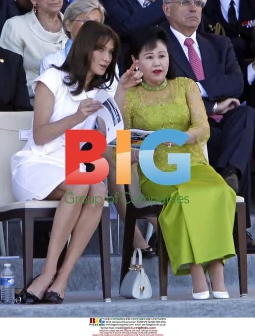 Carla Bruni-Sarkozy and Bounrany Hun Sen at Bastille Day Parade
