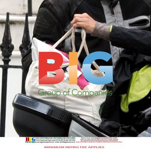 Adrian Chiles and Christine Bleakley spotted leaving flat