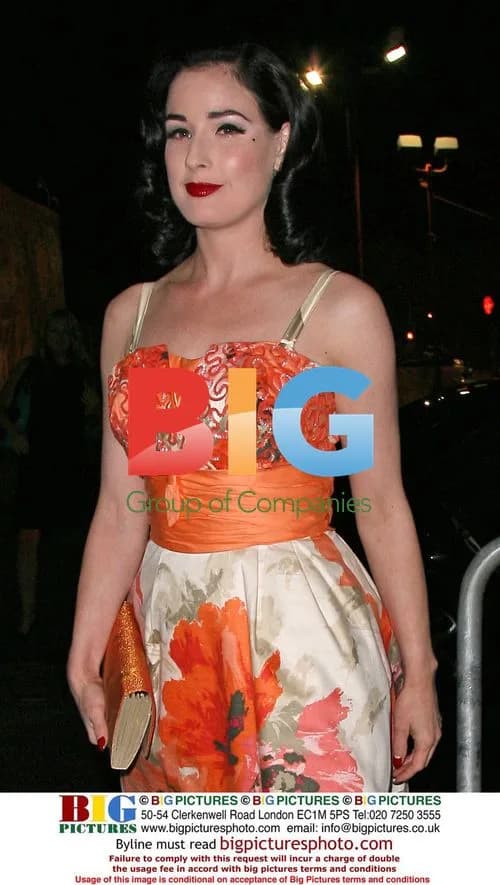 Dita Von Teese in Orange Dress