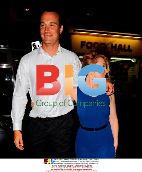 Stuart Clark leaves London restaurant with girlfriend