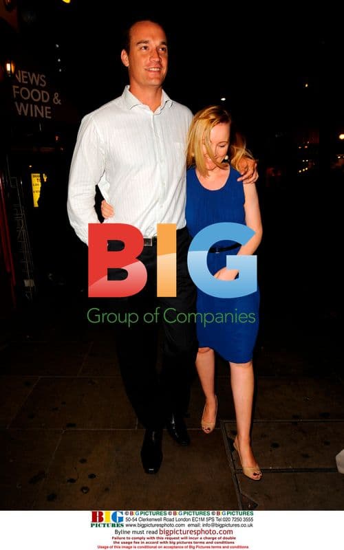 Stuart Clark leaves restaurant with girlfriend