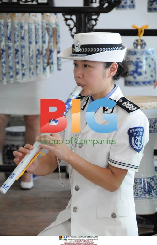 Chinese Policewomen Band with Porcelain Instruments