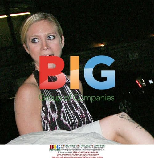 Brittany Snow giggling at nightclub