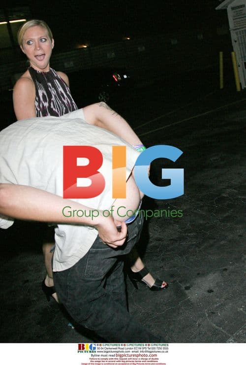 Brittany Snow giggles as flashed leaving club