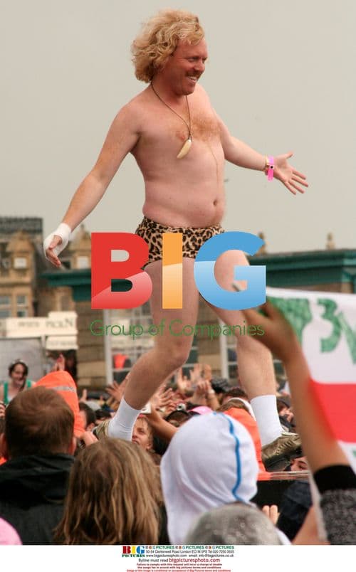 Keith Lemon prances on catwalk at T4 On The Beach