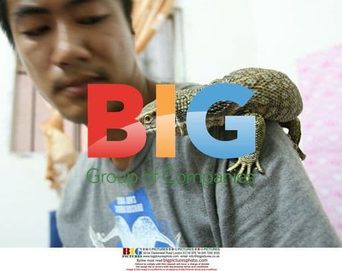 Man with Exotic Pets in China