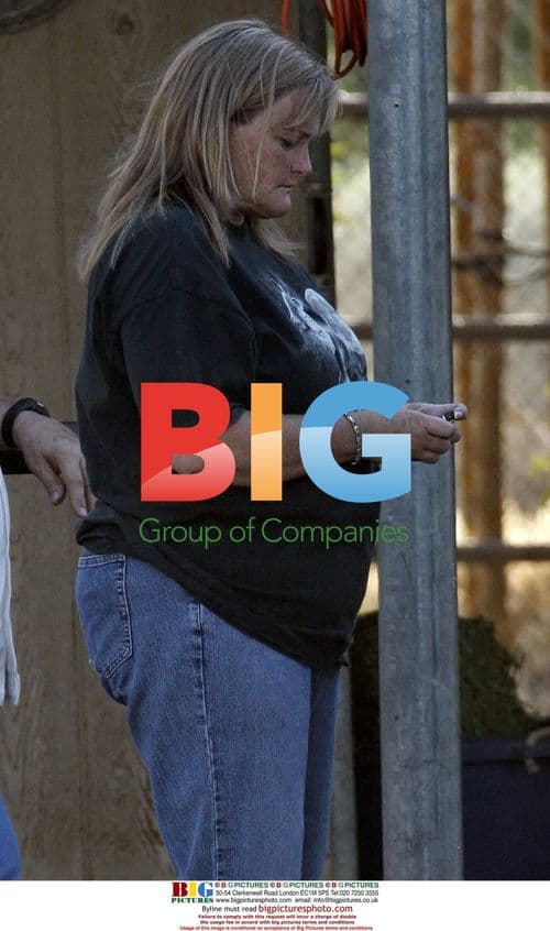 Debbie Rowe takes horse sample in Palmdale