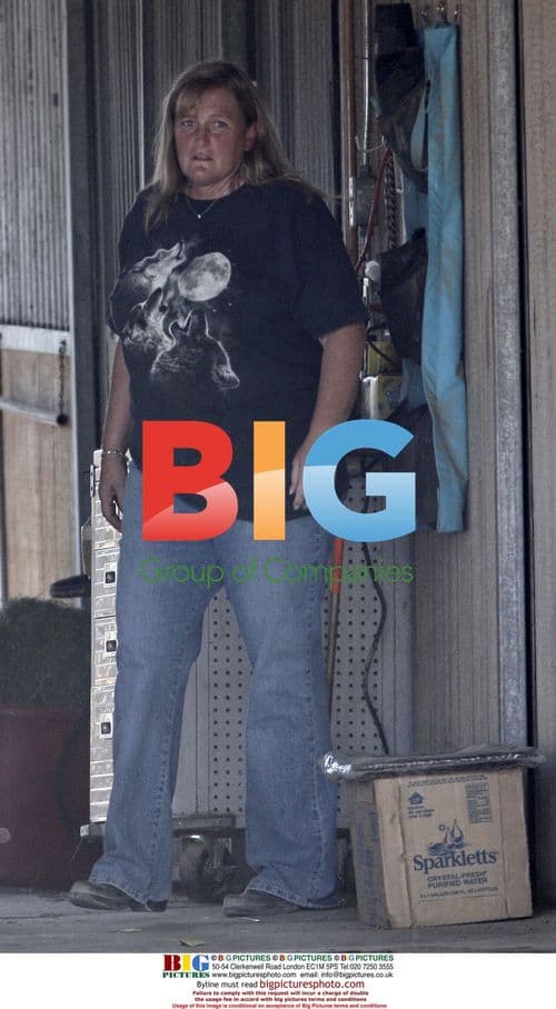 Debbie Rowe takes horse sample for vet