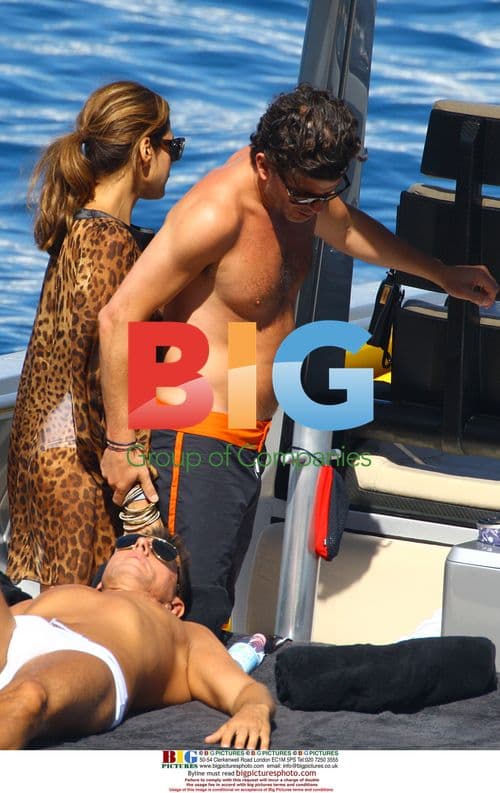 Eva Mendes and George Gargurevich on boat with Dolce and Gabbana