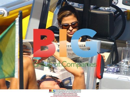 Eva Mendes and boyfriend on boat with Dolce & Gabbana