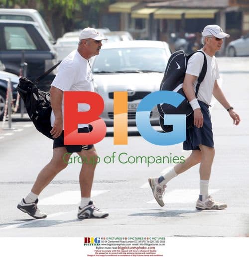 Dr. Phil Relaxes on Holiday Yacht