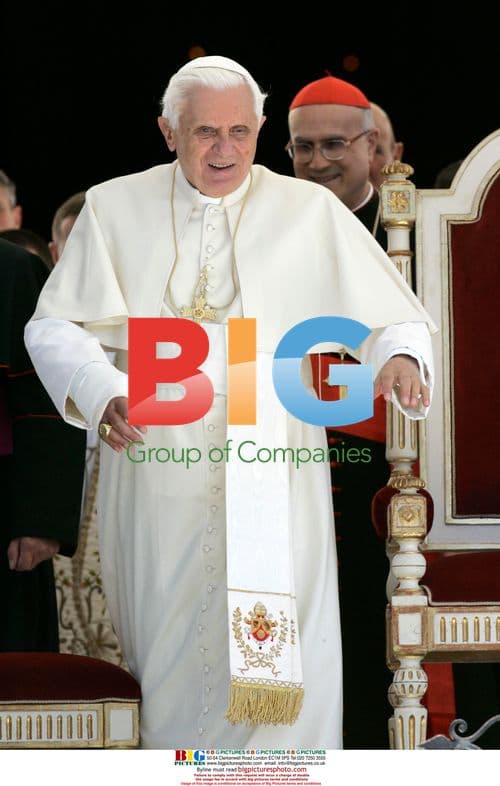 Pope Benedict XVI blesses faithful with cast arm